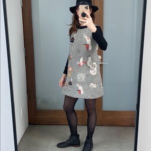 Herringbone pinafore dress with embroidered birds